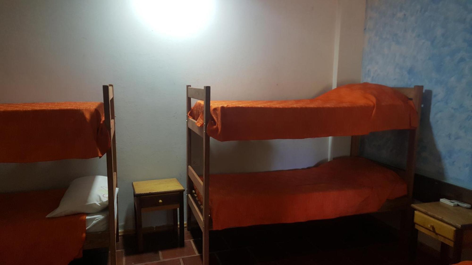 Hotel Y Residencial Amigos ปูแอร์โตอีกวาซู ภายนอก รูปภาพ