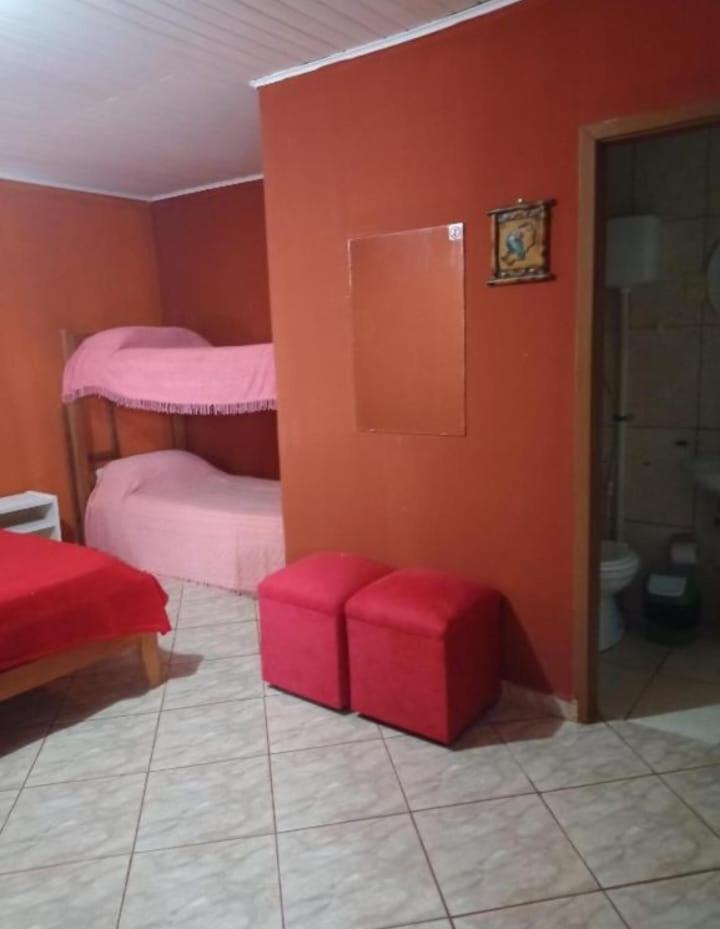 Hotel Y Residencial Amigos ปูแอร์โตอีกวาซู ภายนอก รูปภาพ