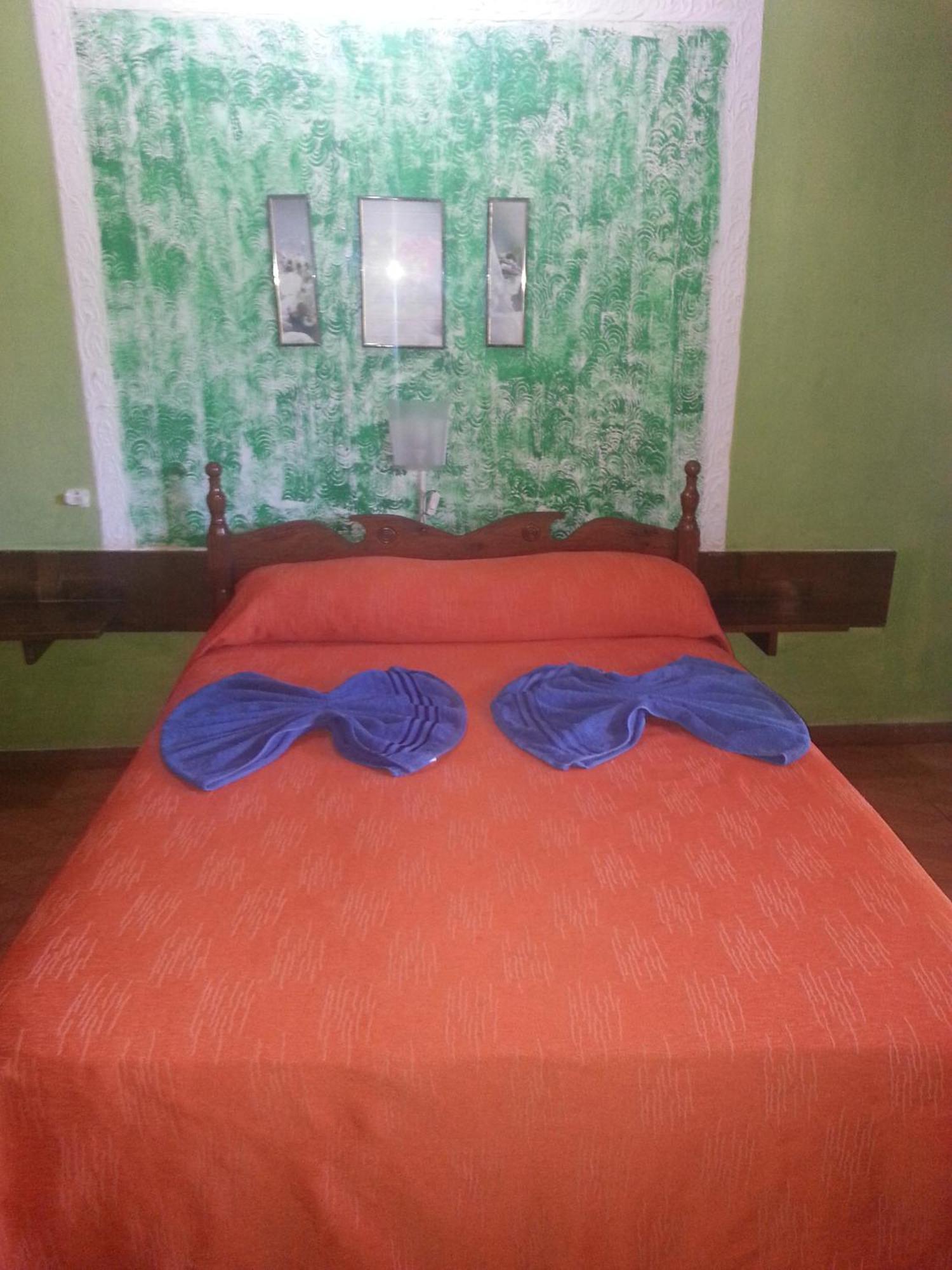 Hotel Y Residencial Amigos ปูแอร์โตอีกวาซู ภายนอก รูปภาพ